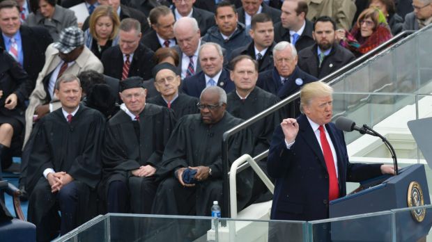 Donald Trump delivers his first address after being sworn in as the 45th president of the United States on Friday.