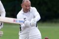 Fierce competitor: Eddie Jones bats during the Rugby Writers' cricket match against the RFU in July.