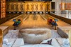 The bowling alley has four lanes and comes stocked with bowling shoes in every size.