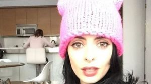 Actress Krysten Ritter shows off her very own pink pussy hat. 