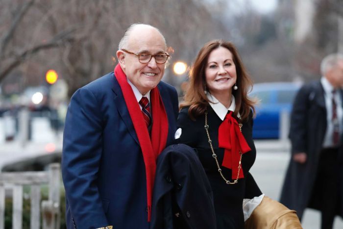 Rudy Giuliani and his wife Judith, arrives for a church service