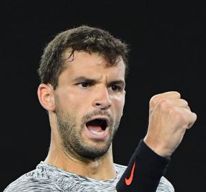 MELBOURNE, AUSTRALIA - JANUARY 21: Grigor Dimitrov of Bulgaria celebrates winning his third round match against Richard ...