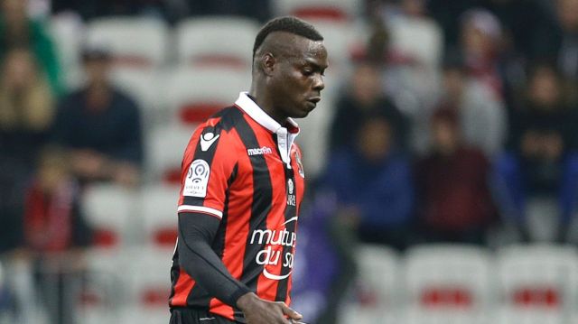 Nice's forward Mario Balotelli, runs with the ball during the League One soccer match between Nice and Lyon, in Nice ...