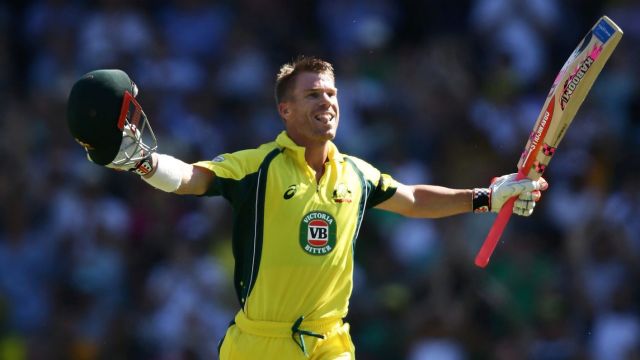 SYDNEY, AUSTRALIA - JANUARY 22: David Warner of Australia celebrates scoring a century during game four of the One Day ...