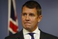 NSW Premier Mike Baird announces his retirement at a press conference on Thursday.