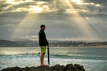 The Oracle, Coolangatta, Queensland Gold Coast. This man was watching and giving advice to a young beginner surfer in ...