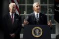 Barack Obama speaks as Vice President Joe Biden stands in the Rose Garden at the White House.