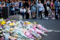 Part of Bourke Street Mall has become a shrine to victims of Friday's tragedy.