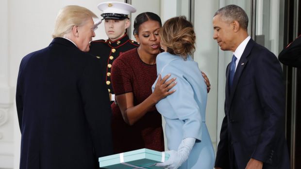 First lady Michelle Obama, flanked by President Barack Obama and President-elect Donald Trump, greets Melania Trump at ...