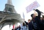 Protesters take part in the Women's March in Paris, France.