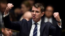 NSW Premier Mike Baird makes a point in Parliament in May, 2014. He announced his resignation today.