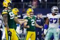 ARLINGTON, TX - JANUARY 15: Mason Crosby #2 of the Green Bay Packers reacts after kicking a field goal in the second ...