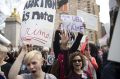 Demonstators at  rally in New York on Thursday protest against Republican presidential candidate Donald Trump's remarks ...