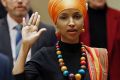 State Rep. Ilhan Omar takes the oath of office as the 2017 Legislature convened Tuesday.