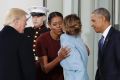 First lady Michelle Obama, flanked by President Barack Obama and President-elect Donald Trump, greets Melania Trump at ...