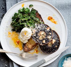 Roasted mushrooms with poached eggs, confit garlic and chilli kale.