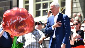 Malcolm Turnbull lays flowers at a makeshift Bourke Street memorial.