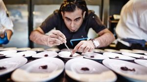 Chef Gaggan Anand plates for service. 