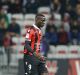 Nice's forward Mario Balotelli, runs with the ball during the League One soccer match between Nice and Lyon, in Nice ...