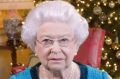 Queen Elizabeth II poses for a photo in the Regency Room of Buckingham Palace after recording her traditional Christmas ...