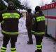 Rescuers wait next to a fire truck in Abruzzo on Thursday morning.