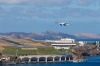 MADEIRA, PORTUGAL. The runway sits close to the sea at the base of a long sloping hill that generates powerful ...