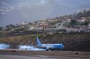 MADEIRA, PORTUGAL. The runway sits close to the sea at the base of a long sloping hill that generates powerful ...