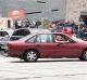 The car doing burnouts at the junction of Flinders and Swanston street.