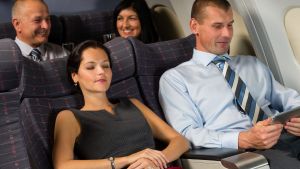 It's not hard to ask the person behind you before reclining your seat.