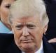 President Donald Trump pumps his fist after delivering his inaugural address.