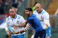 Sebastien Tillous-Borde of France passes the ball in a match that featured 37 handling errors.