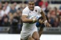 England's Jonathan Joseph races clear to score against Italy in Rome on Sunday.