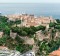 Monaco - it's tiny and shares its border with only one other country.