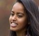 FILE - In this April 7, 2016 file photo, President Barack Obama and his daughter Malia, walk across the South Lawn of ...