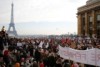 Crowds of protesters gather near Paris' Eiffel Tower