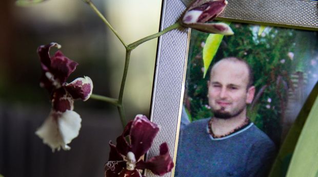 Darren Galea, in a photo alongside an orchid at his father's home, lived a quiet life and had few social connections.