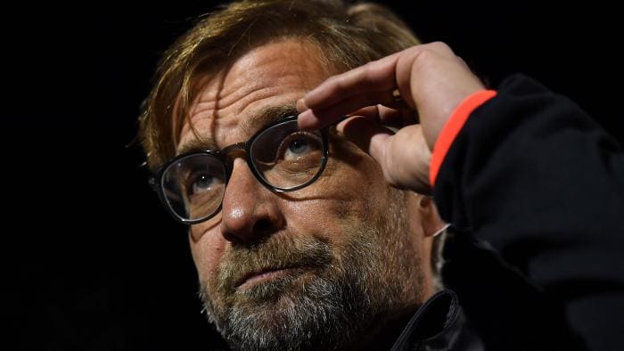 Liverpool's German manager Jurgen Klopp adjusts his glasses as he gives an interview ahead of the English FA Cup third round replay football match between Plymouth Argyle and Liverpool at Home Park in Plymouth, south west England on January 18, 2017. / AFP PHOTO / Ben STANSALL / RESTRICTED TO EDITORIAL USE. No use with unauthorized audio, video, data, fixture lists, club/league logos or 'live' services. Online in-match use limited to 75 images, no video emulation. No use in betting, games or single club/league/player publications. /