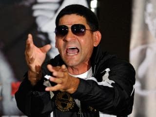 LAS VEGAS, NV - JULY 12: Boxer Danny Garcia's father and trainer Angel Garcia gestures during the final news conference at the Mandalay Bay Resort & Casino on July 12, 2012 in Las Vegas, Nevada. Garcia will take on Amir Khah for the WBC super lightweight world championship on July 14 in Las Vegas. (Photo by David Becker/Getty Images)