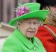 The Queen and Prince Philip ride in a carriage during the Trooping The Colour parade at Buckingham Palace in London on ...