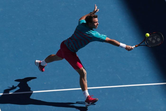 Stanislas Wawrinka returns a shot