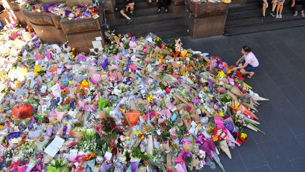 Love of the people: The mass of flowers placed by the public outside Melbourne GPO in tribute to the victims of the ...