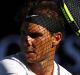 MELBOURNE, AUSTRALIA - JANUARY 21: Rafael Nadal of Spain plays a forehand in his third round match against Alexander ...