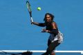 Long history: Serena Williams plays a forehand on her way to beating Nicole Gibbs.