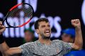 Cancel the alarm ... Bulgaria's Grigor Dimitrov celebrates after defeating France's Richard Gasquet during their third ...