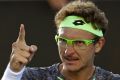 Zero to hero ... Uzbekistan's Denis Istomin celebrates after defeating Spain's Pablo Carreno Busta in the third round of ...