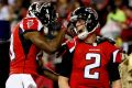 ATLANTA, GA - JANUARY 22: Matt Ryan #2 of the Atlanta Falcons celebrates with Aldrick Robinson #19 after a 14 yard ...