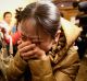 Anguish in Beijing as relatives learn MH370 has gone missing on March 9, 2014.