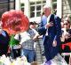 Malcolm Turnbull lays flowers at a makeshift Bourke Street memorial.