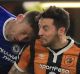 Ryan Mason of Hull City and Gary Cahill of Chelsea collide.