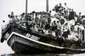 A group of Vietnamese boat people arriving in Australia.